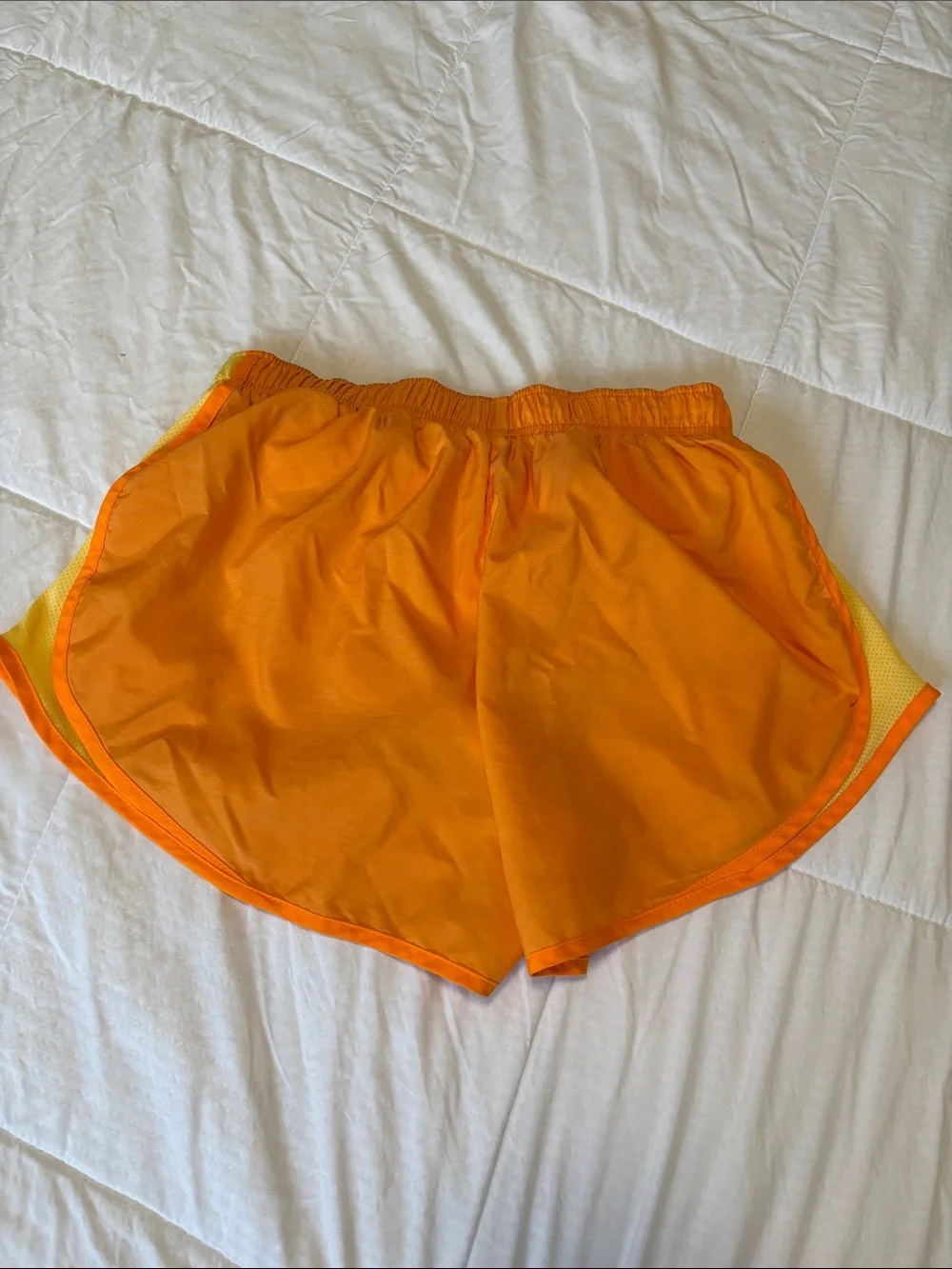 Nike Women's Bright Orange Athletic Shorts with Yellow Trim